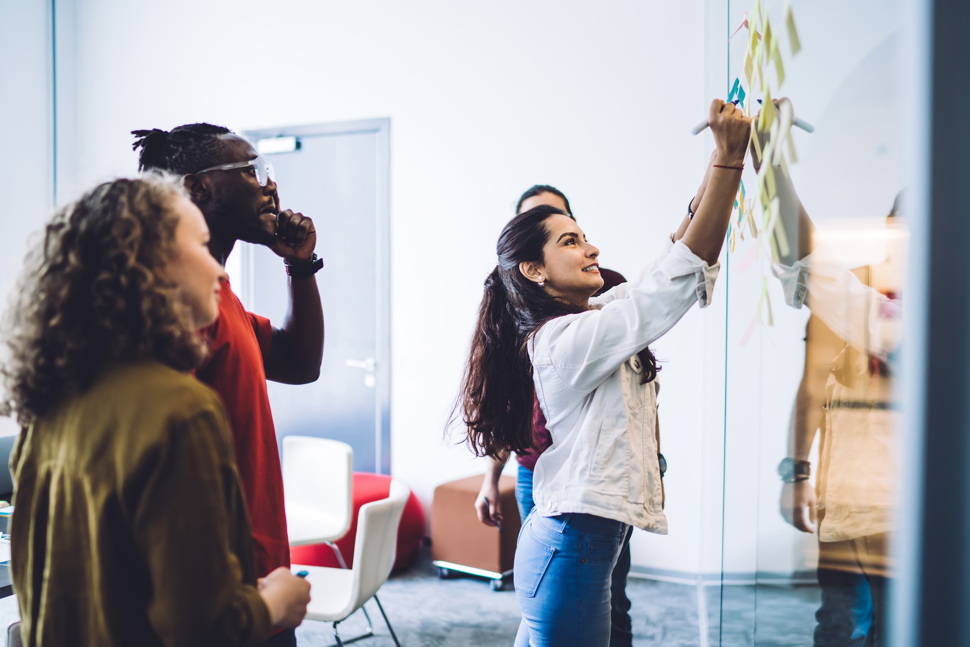 people-working-on-whiteboard-together